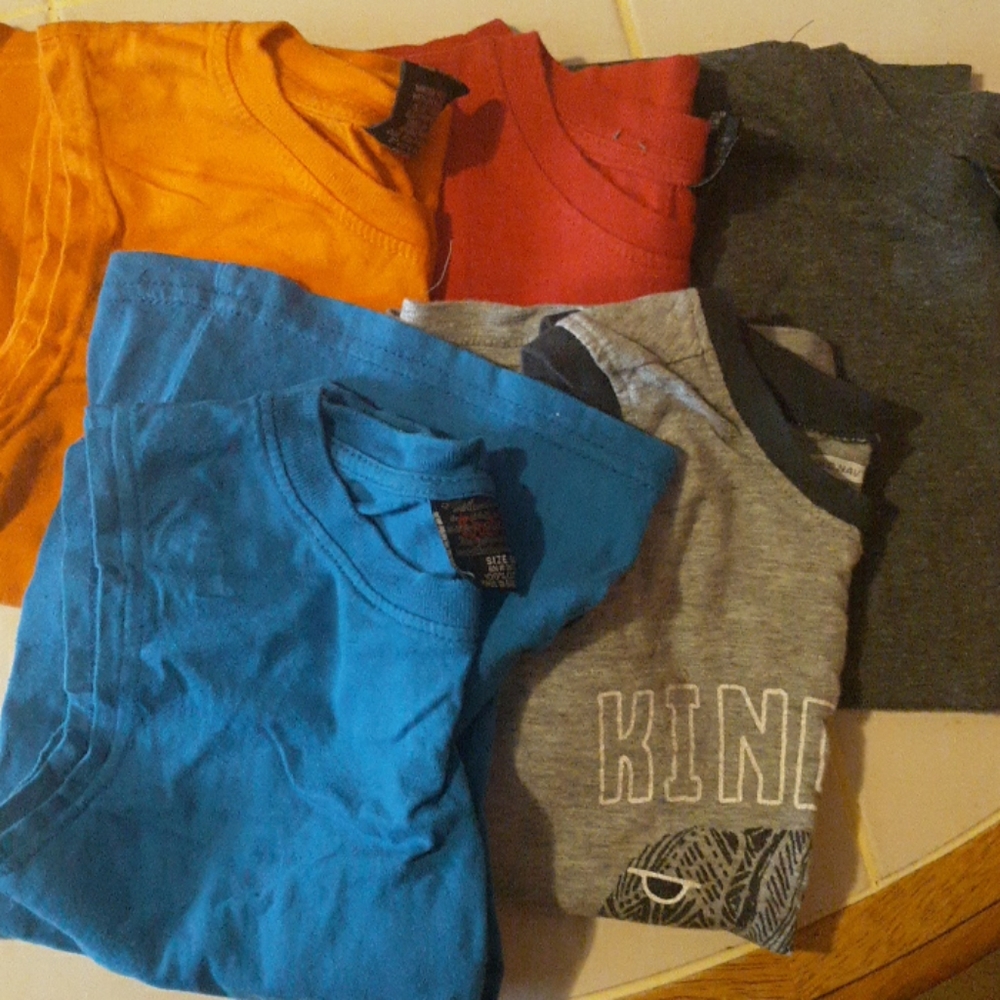 Boys tank tops one is 5t and the rest are 5/6.